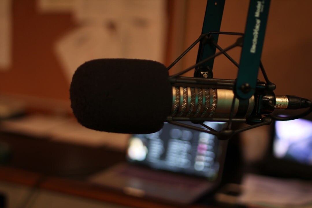 Podcast microphone setup in a radio studio