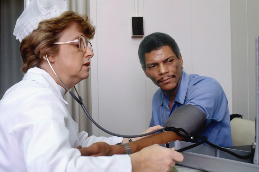elderly patient with doctor